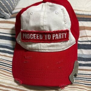 Toby Keith’s I Love This Bar “Proceed to Party” cap with built-in bottle opener